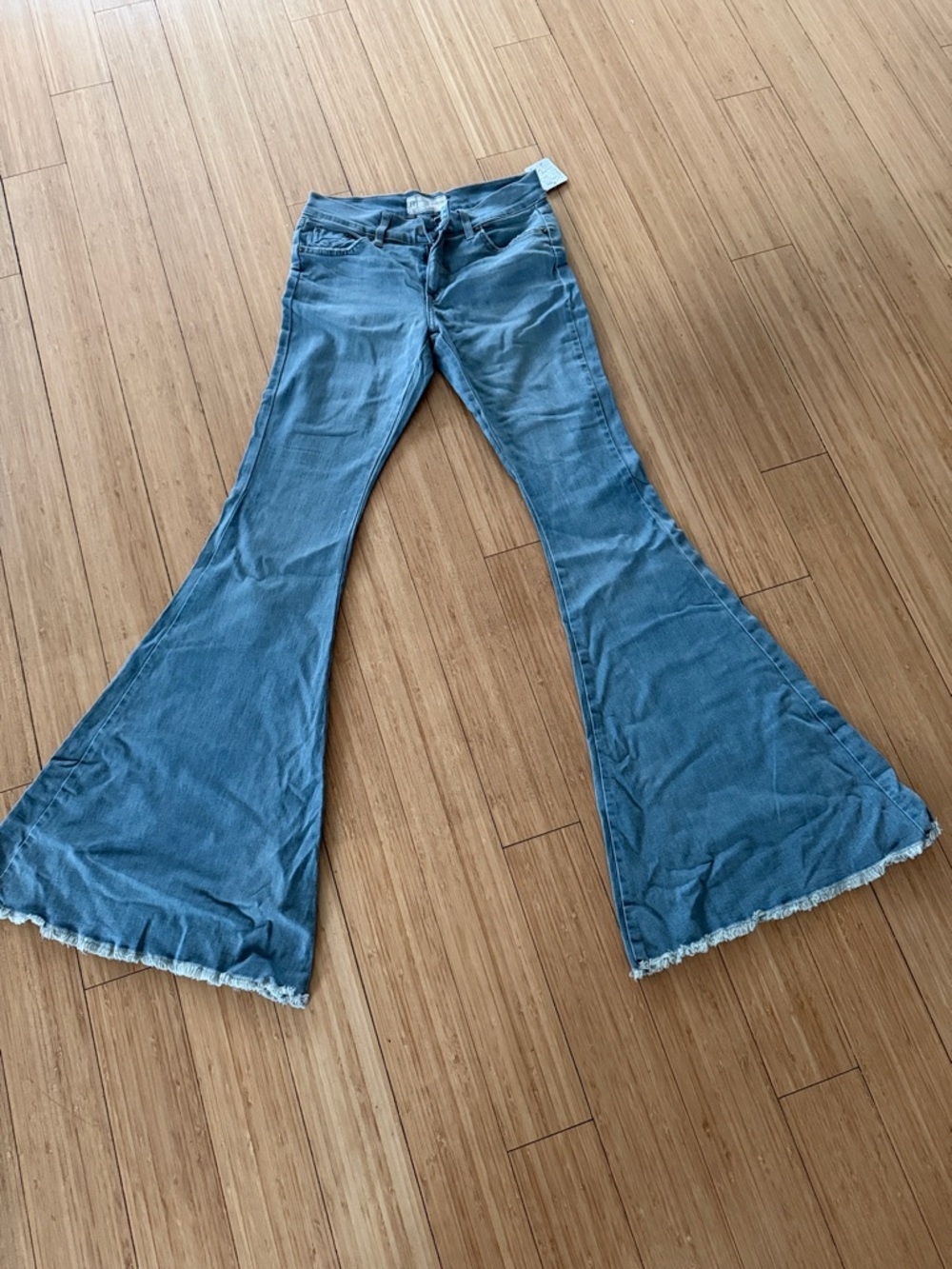 Free People Light Blue Wide Leg Flare Jeans with Frayed Hem